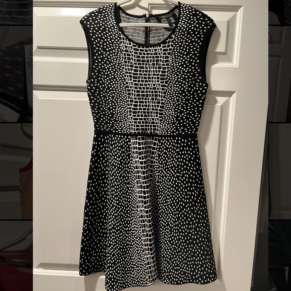 BCBG MaxAzria Sleeveless fashionable black and white dress. Size M.